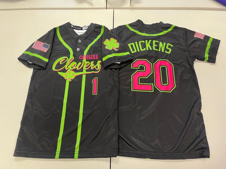 Two black sports jerseys with neon green trim, displaying Cheers and Dickens with numbers 1 and 20, featuring American flag patches